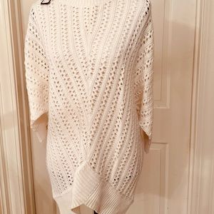 Modern open weave, drop needle sweater.